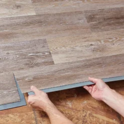 6 in. W Brushed Oak Taupe GripStrip Luxury Vinyl Plank Flooring (24 sq. ft./case) by TrafficMaster 14 6 in. W Brushed Oak Taupe GripStrip Luxury Vinyl Plank Flooring (24 sq. ft./case) by TrafficMaster -Deals Flooring Luxe Store brushed oak taupe trafficmaster vinyl plank flooring 95311 44 1000
