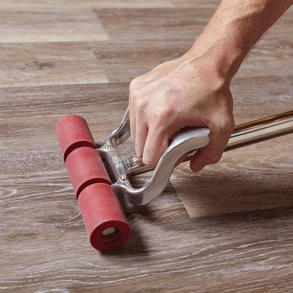 6 in. W Brushed Oak Taupe GripStrip Luxury Vinyl Plank Flooring (24 sq. ft./case) by TrafficMaster 10 6 in. W Brushed Oak Taupe GripStrip Luxury Vinyl Plank Flooring (24 sq. ft./case) by TrafficMaster - Image 8