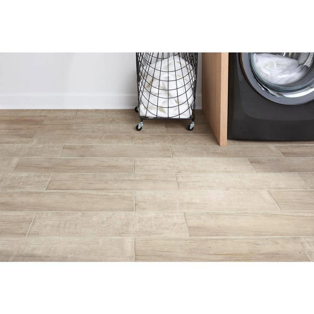 Capel Timber 6 in. x 24 in. Matte Ceramic Wood Look Floor and Wall Tile (16.8 sq. ft./Case) by TrafficMaster 4 Capel Timber 6 in. x 24 in. Matte Ceramic Wood Look Floor and Wall Tile (16.8 sq. ft./Case) by TrafficMaster - Image 2